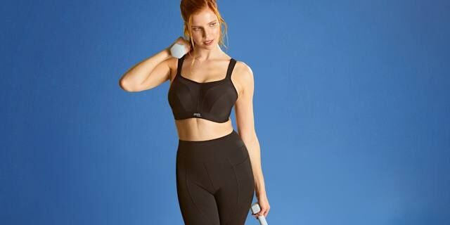 Woman wearing supportive sports bra with confidence