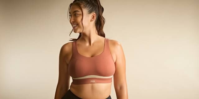 Woman wearing supportive sports bra with confidence