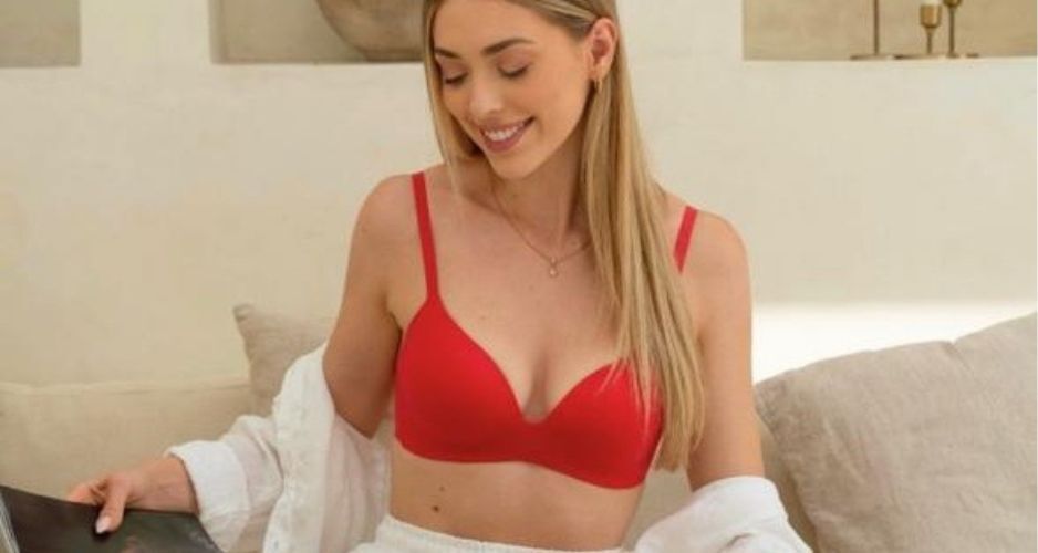 Woman relaxing in silk-soft Royal Lounge lingerie and loungewear